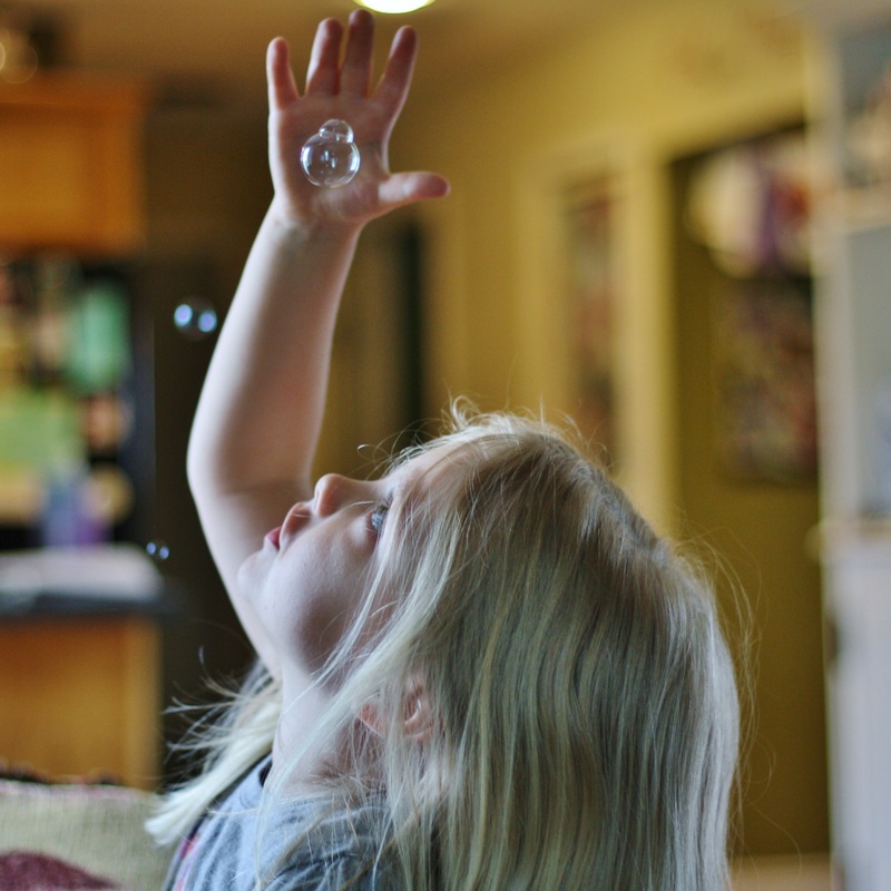 Hilary's Home Daycare - Catching bubbles hand/eye coordination, visual tracking, relational mathematics terms, surface tension science